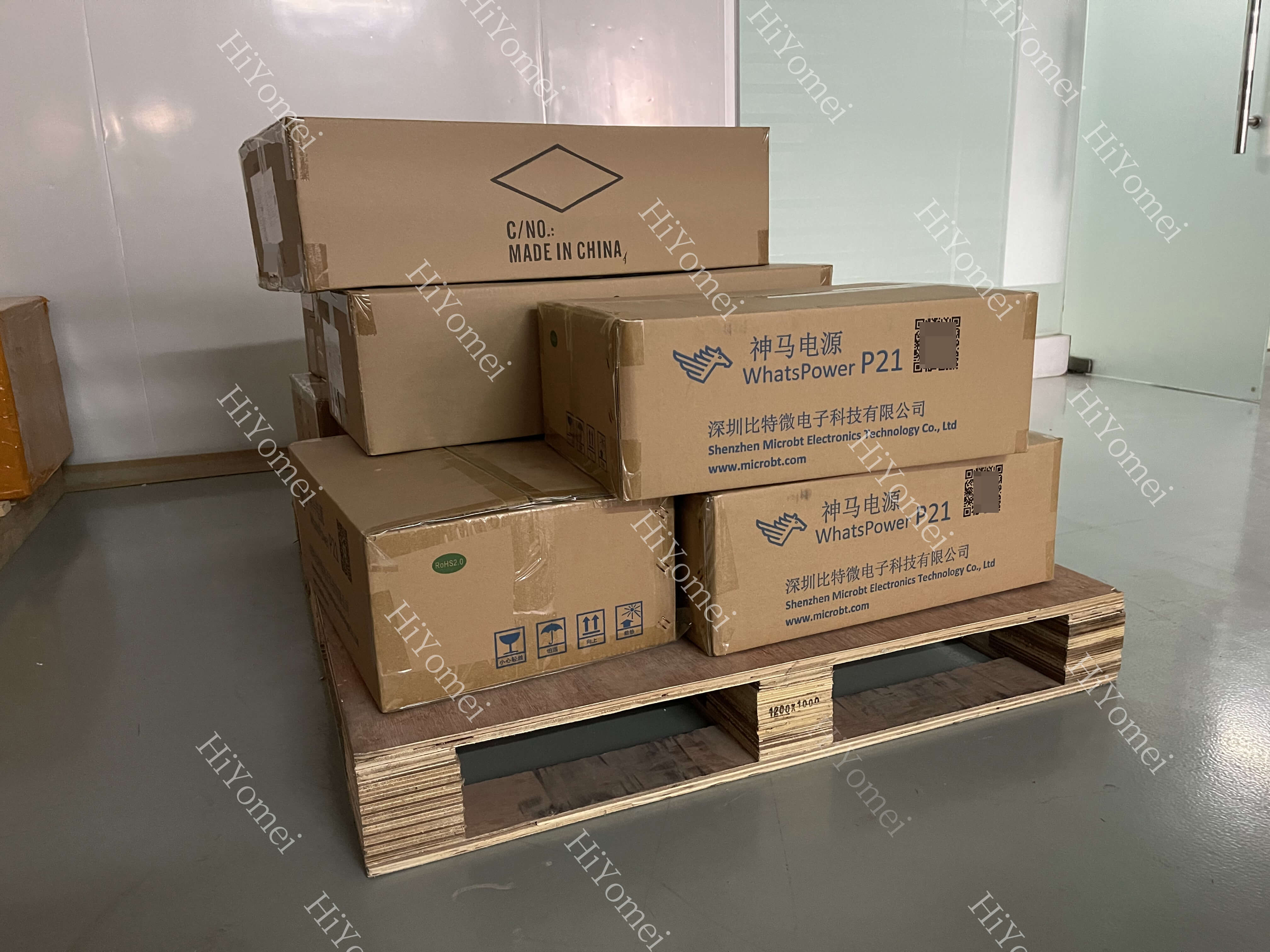 Unpacked boxes of MicroBT WhatsMiner H6OS control boards and P232B power supplies
